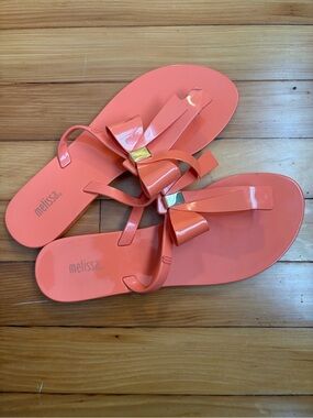 Melissa Coral Bow Flip Flop Sandals with Gold Accent